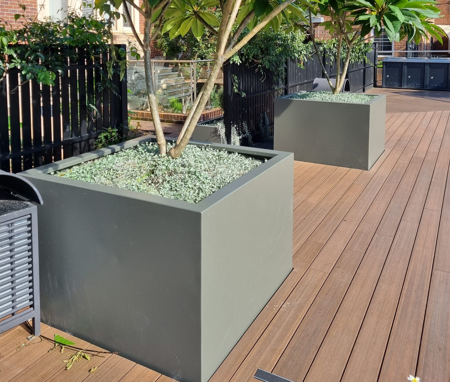 Aluminium planters at a corporate campus entrance